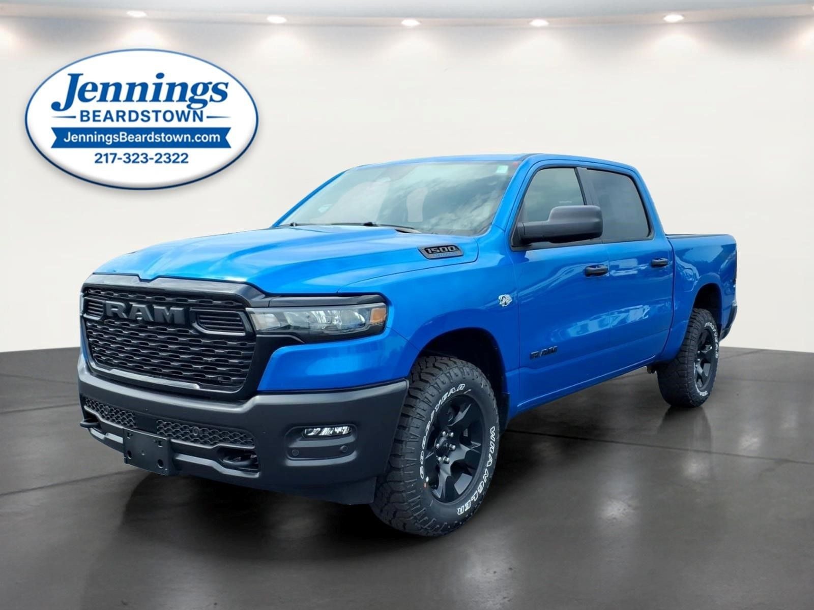 2026 RAM Ram 1500 RAM 1500 WARLOCK CREW CAB 4X4 5'7' BOX in Hydro Blue Pearl-Coat Exterior Paint — front three-quarter view
