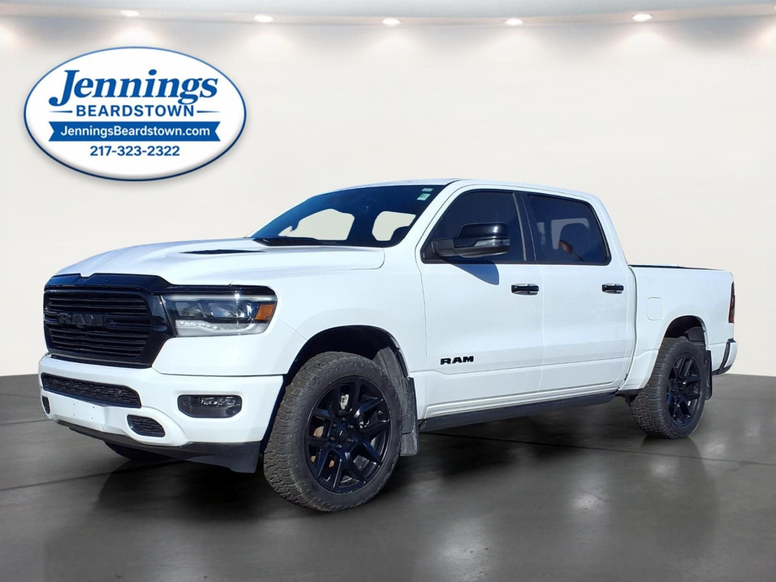 2022 RAM 1500 Laramie Crew Cab 4x4 5'7' Box in Bright White — front three-quarter view