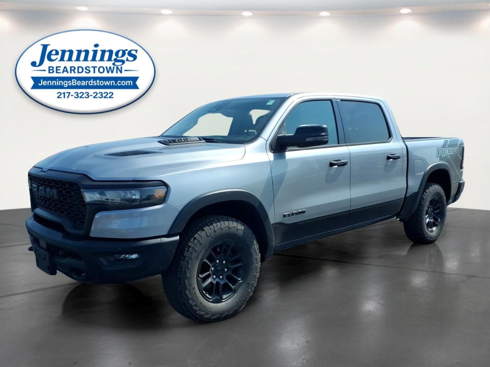 2025 RAM 1500 Rebel Crew Cab 4x4 5'7' Box in Billet Silver Metallic Clearcoat — front three-quarter view