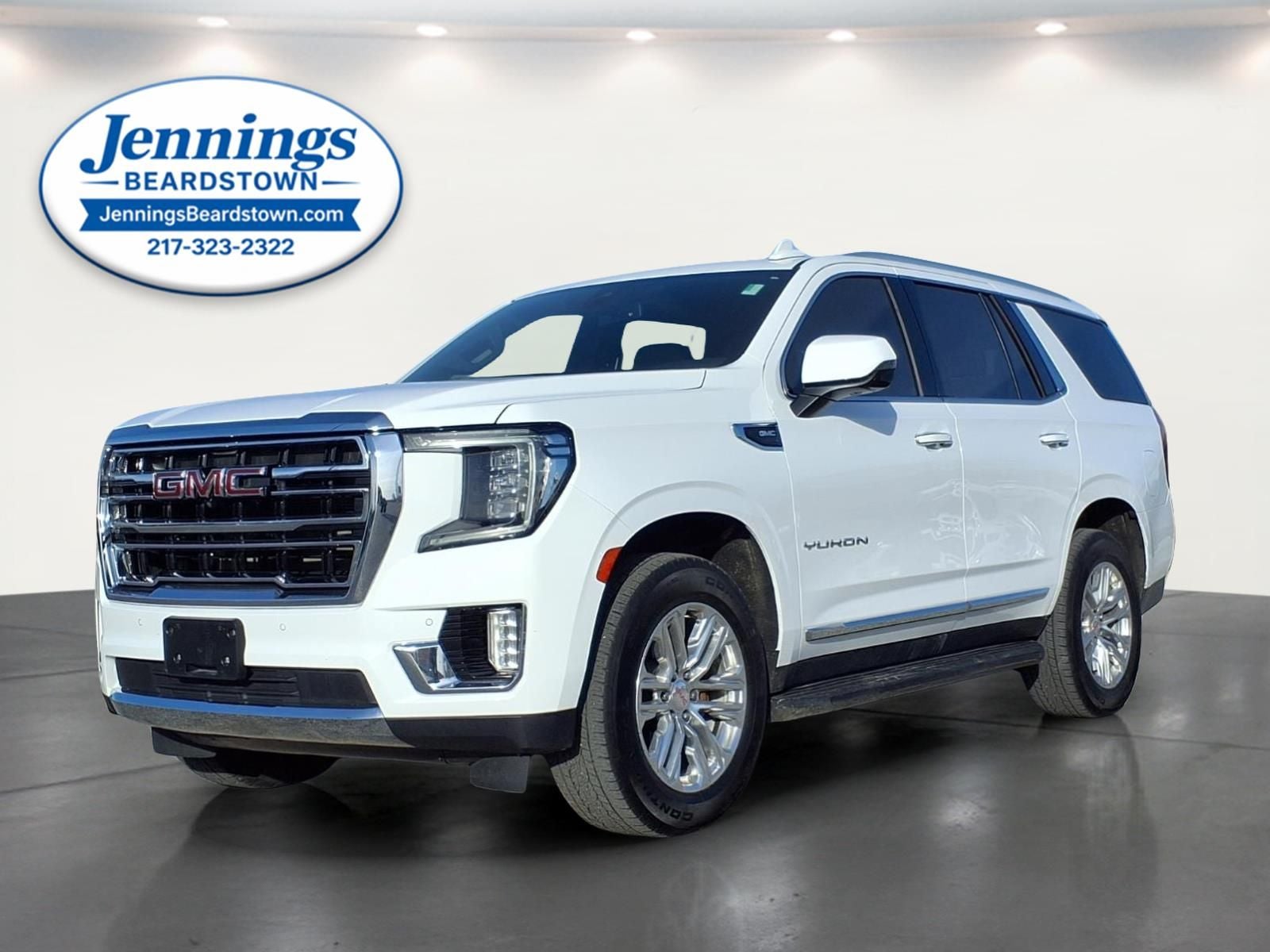 2022 GMC Yukon 4WD SLT in Summit White — front three-quarter view