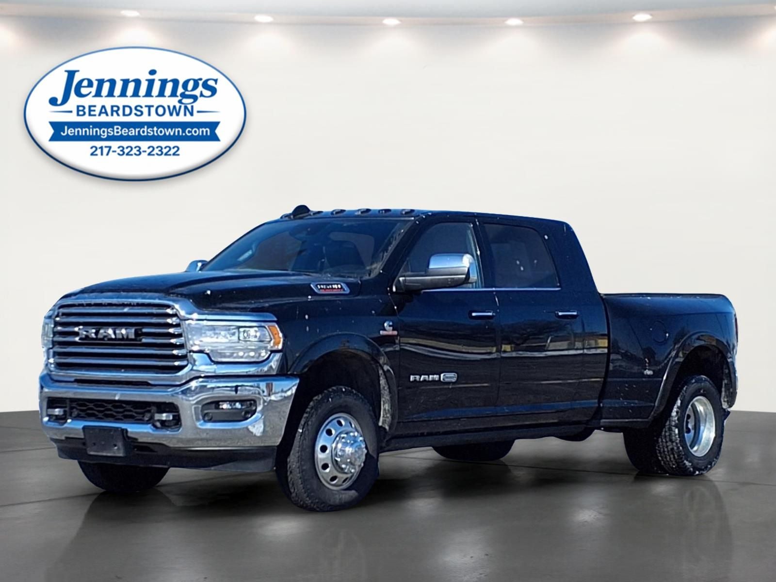 2019 RAM 3500 Longhorn Mega Cab 4x4 6'4' Box in Diamond Black Crystal Pearlcoat — front three-quarter view
