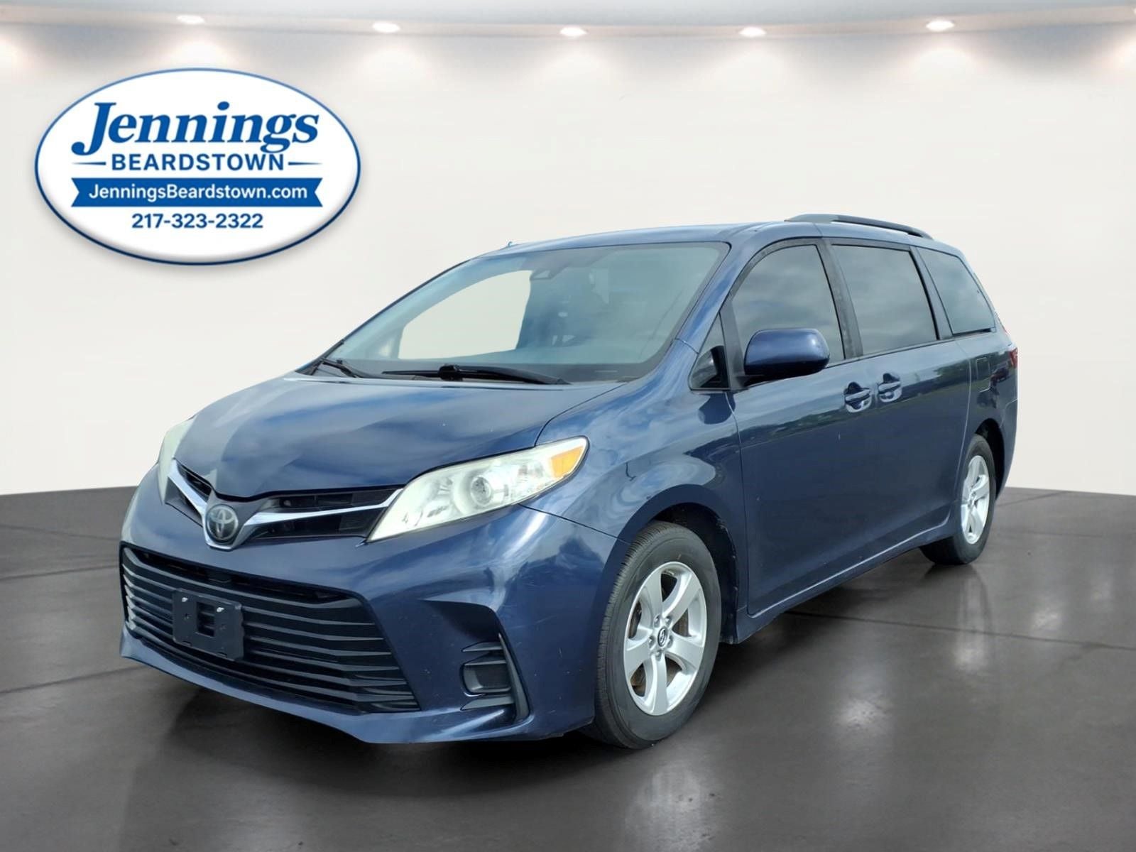 2018 Toyota Sienna LE 8 Passenger in Parisian Night Pearl — front three-quarter view