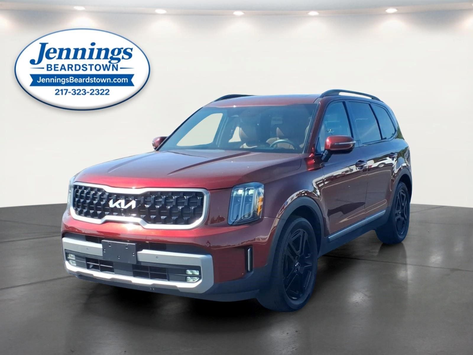 2023 Kia Telluride SX Prestige X-Line in Dawning Red — front three-quarter view