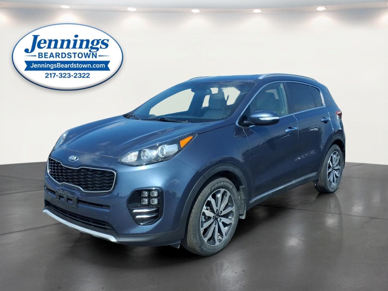 2018 Kia Sportage EX in Pacific Blue — front three-quarter view